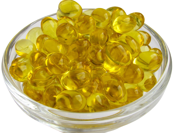 A cup overflowing with yellow softgel capsules, representing vitamin D supplements, illustrating the topic of the RDA vs. optimal dosage of vitamin D for heart health