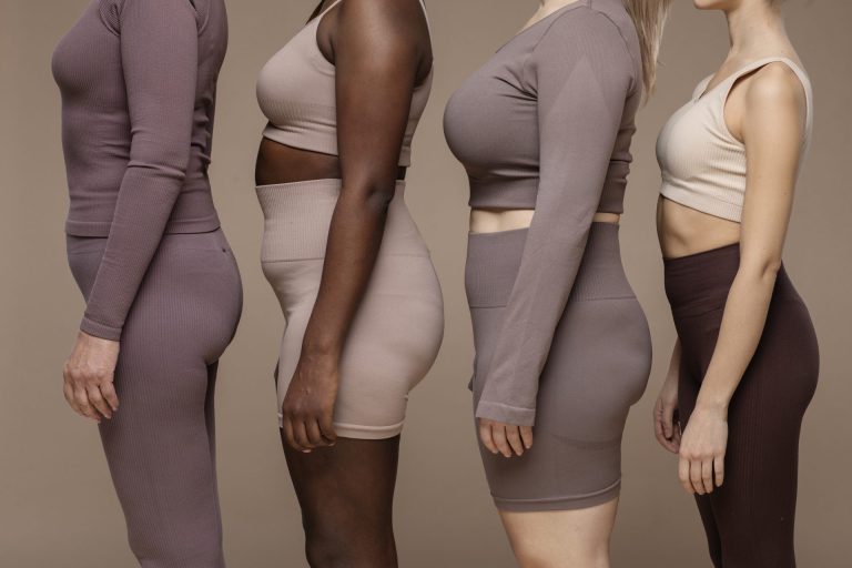 A diverse group of women showcasing a variety of body composition types.